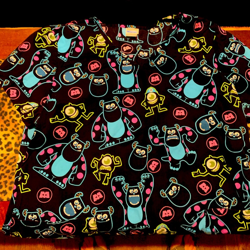 Monsters Inc scrub top. XL.
